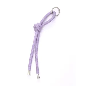 Portachiavi a cinturino in denim intrecciato viola con anello argento per borse.