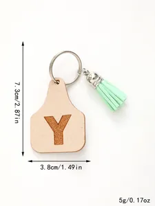 Detail of farm-style letter Y keychain with mint green tassel and measurements.