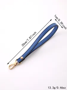 Detailed view of the blue leather wrist strap including dimensions and lobster clasp.