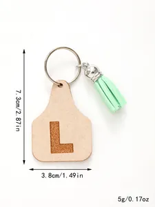 Detailed view of the letter L keychain featuring a mint green tassel and dimensions