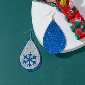 Festliche blaue Weihnachts-Glitzerohrringe in Tropfenform mit silberner Schneeflocke