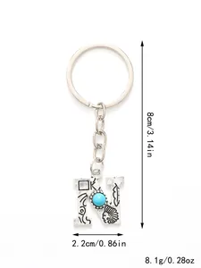 Detailed dimensions and weight of the silver-tone alloy letter N keychain charm.