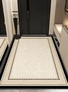 Geometric loop pile entrance mat with black border design in a modern hallway setup