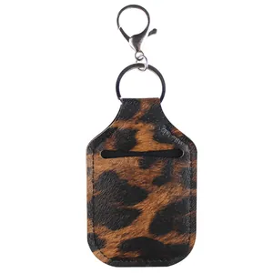 Stylish leopard print faux leather hand sanitizer holder with metal keyring and clasp