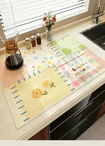 Colorful dopamine style kitchen drying mat with Sweet moment text on a clean countertop