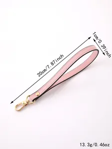 Detailed view of the pink wristlet strap showing measurements 20cm length and 1cm width