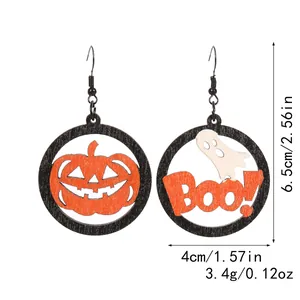 Halloween wooden earrings featuring a pumpkin and a ghost 'Boo!' design detail view