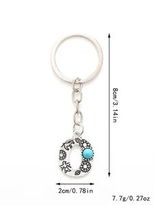 Detail view of alloy letter O keychain with turquoise and size labels