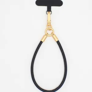 Premium black PU leather phone lanyard strap with elegant gold metal clasp and gasket