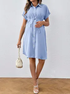 Light blue short sleeve maternity shirt dress with drawstring waist detail for summer