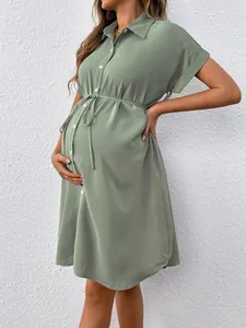 Maternity sage green short sleeve shirt dress with adjustable waist tie and buttons