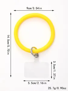 Vista dettagliata del ciondolo per telefono in silicone giallo con dimensioni e peso esatti