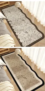 Long French-style bedroom runner rug with vintage floral patterns and scalloped edges.