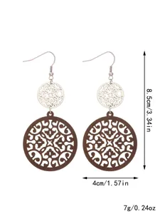 Detailed view of vintage wooden hollow pattern earrings with measurements