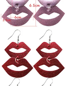 Detail view of red and pink lip-shaped leather earrings showing size measurements in cm