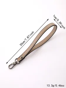 Detail view of beige PU leather wrist strap accessory with measurements 20cm by 1cm