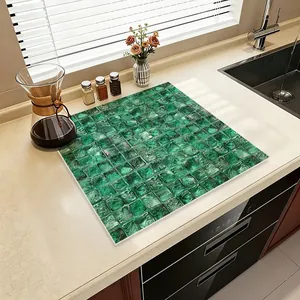 Premium green mosaic textured absorbent leather mat for kitchen countertop protection.