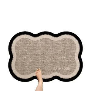 Rutschfeste saugfähige Diatomeenerde-Badematte mit gewelltem Rand und Textaufdruck