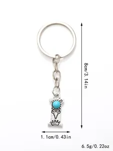 Detail view of letter I alloy keychain with turquoise bead and dimension markings
