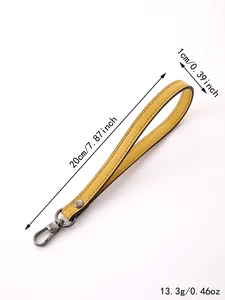 Detailed dimensions of yellow leather wristlet strap with gray metal clasp