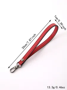 Red leather wristlet strap with metallic clasp and rivet detail, 20cm length and 1cm width
