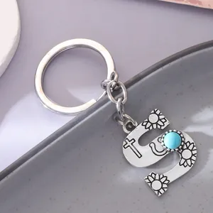 Vintage silver alloy letter S keychain featuring turquoise stone and engraved floral patterns