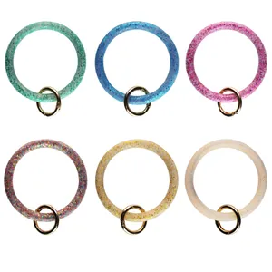 Set di sei portachiavi a bracciale in silicone glitterato con anelli dorati per fai-da-te