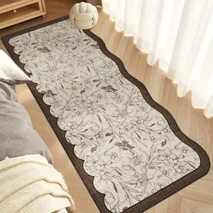 Elegant French vintage floral bedside runner rug with scalloped edges for bedroom decor