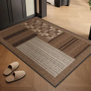 Zerbino d'ingresso marrone geometrico in stile moderno su pavimento in legno