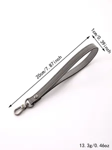 Detailed view of grey leather wrist strap with metal lobster clasp, 20cm length and 1cm width