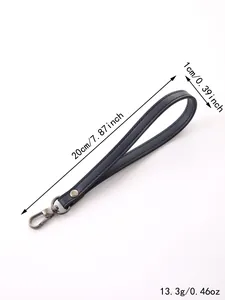 Detail showing 20cm leather wrist strap with a metal swivel clasp and weight specs