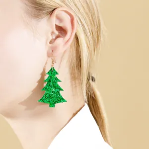 Sparkling green glitter Christmas tree earrings for festive holiday celebration