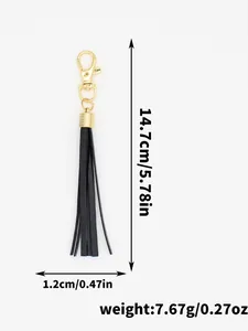 Detailed dimensions of black leather tassel keychain with gold clasp showing weight