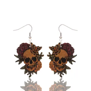 Gothic Halloween wooden skull dangle earrings featuring red roses and butterfly accents