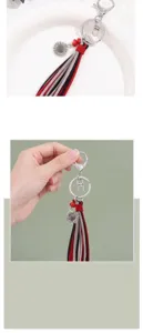 Close-up of retro sunflower tassel keychain with colorful suede strips and beads