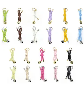 Colorful leather knot keychains with heart pendants in various pastel shades