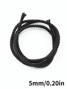 Macro detail of 5mm black braided PU leather rope for crafts, phone lanyards and keychains