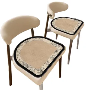 Elegant French vintage style faux linen chair cushions with floral patterns and black trim