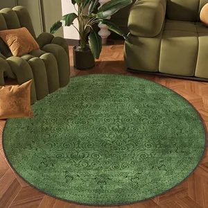 Detail of vintage round green rug with ornate patterns for a stylish living room decor