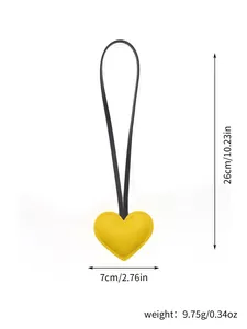 Minimalist heart-shaped leather bag charm with 26cm height and 9.75g product weight
