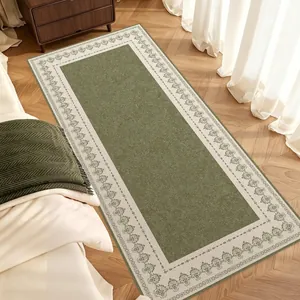 French retro loop velvet long bedside rug with a green center and ornate border