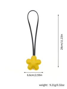 Detailed dimensions and weight specifications for yellow leather flower bag charm