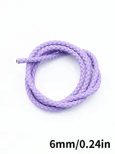 Macro view of 6mm purple PU braided leather cord with three-strand twist for DIY crafts