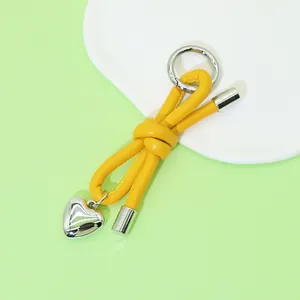 Ins Style Woven Faux Leather Rope Bowknot Keychain Charm With Heart Pendant Metal Spring Ring Bag Accessory For Women Keyring