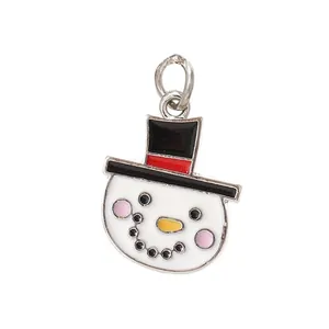 Detailed view of enamel snowman charm pendant for Christmas DIY jewelry