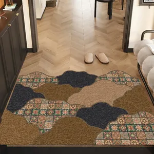 Vintage deurmat met onregelmatig geometrisch tegelpatroon en antislip achterkant