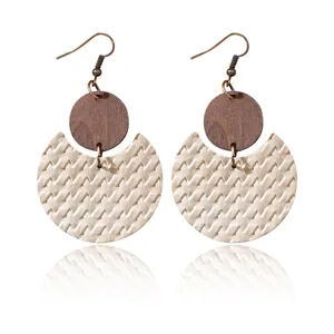 Bohemian crescent-shaped leather and wood drop earrings with woven texture details