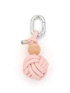 Detailed view of a pink braided PU leather knot charm with silver carabiner buckle