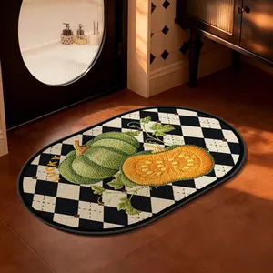 Oval linen bathroom mat with embroidered pumpkin design and checkerboard background pattern