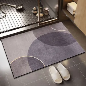 Modern purple geometric diatom mud absorbent bathroom mat shown in home shower setting